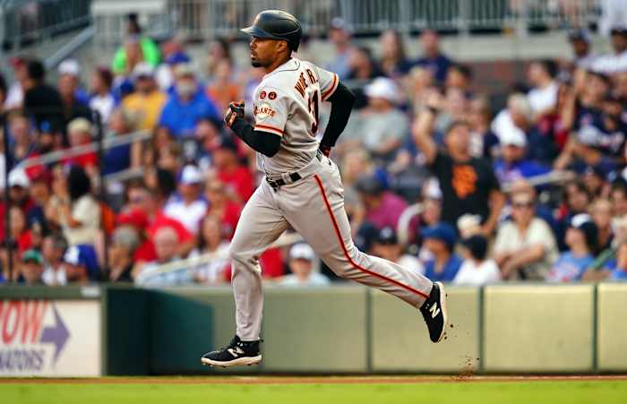 SF Giants first baseman LaMonte Wade Jr. rounds the bases on his solo homer against the Atlanta Braves during the first inning at Truist Park on August 19, 2023.